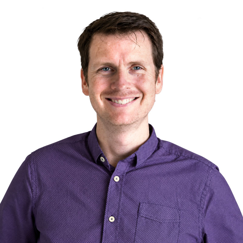 Headshot of Thomas Bacon.